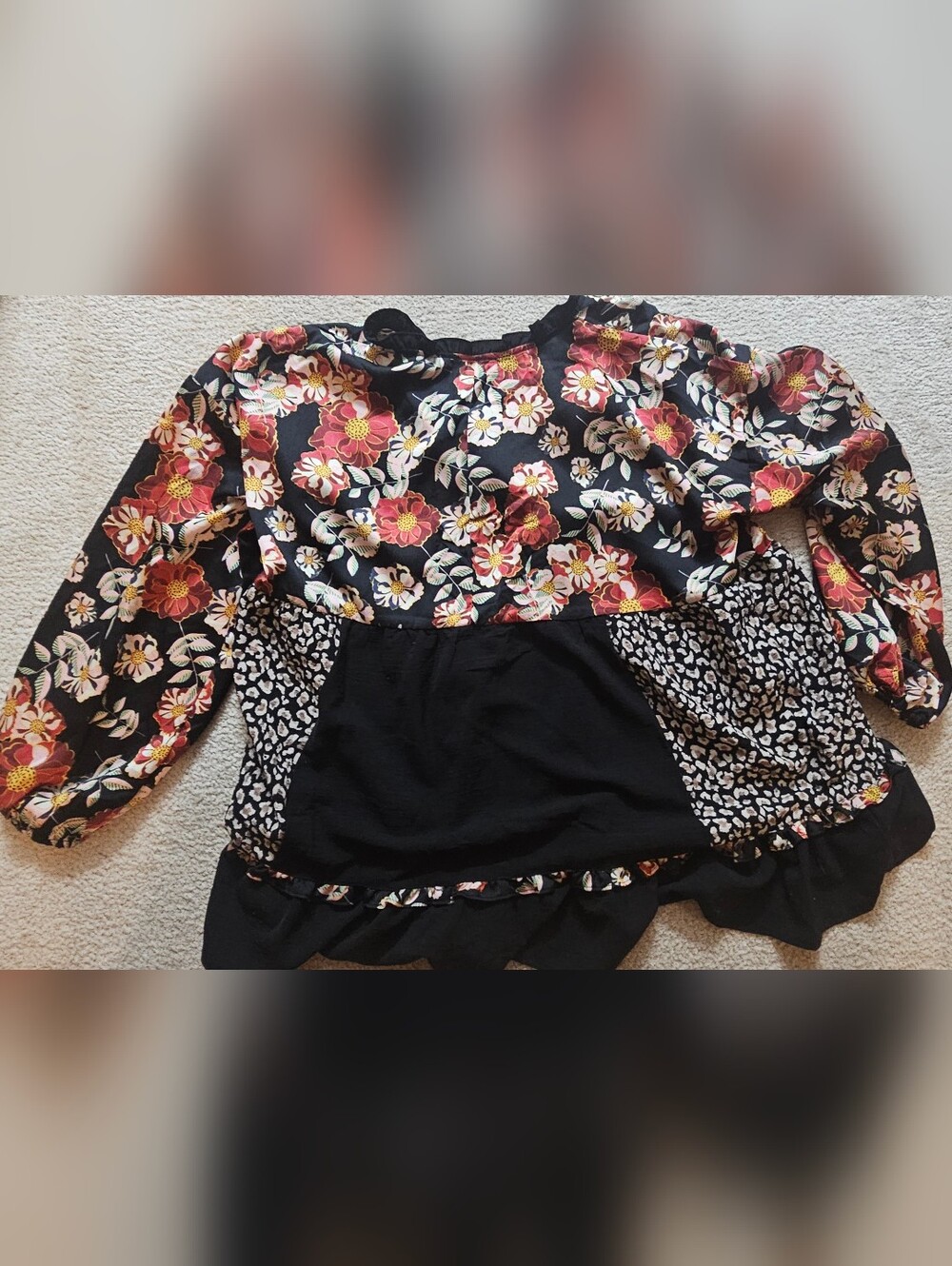 Umgee babydoll blouse features a bold, mixed design combining bohemian andanimal - Picture 9 of 10